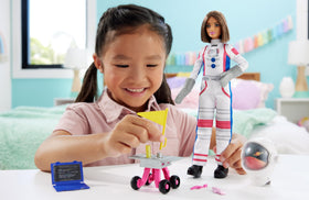 Barbie astronaut with rolling rover for engaging space exploration play