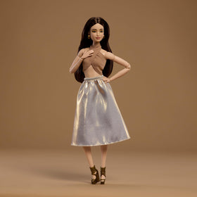 Barbie Basics Model 06 brunette with halter top, ideal for mix-and-match play scenarios.