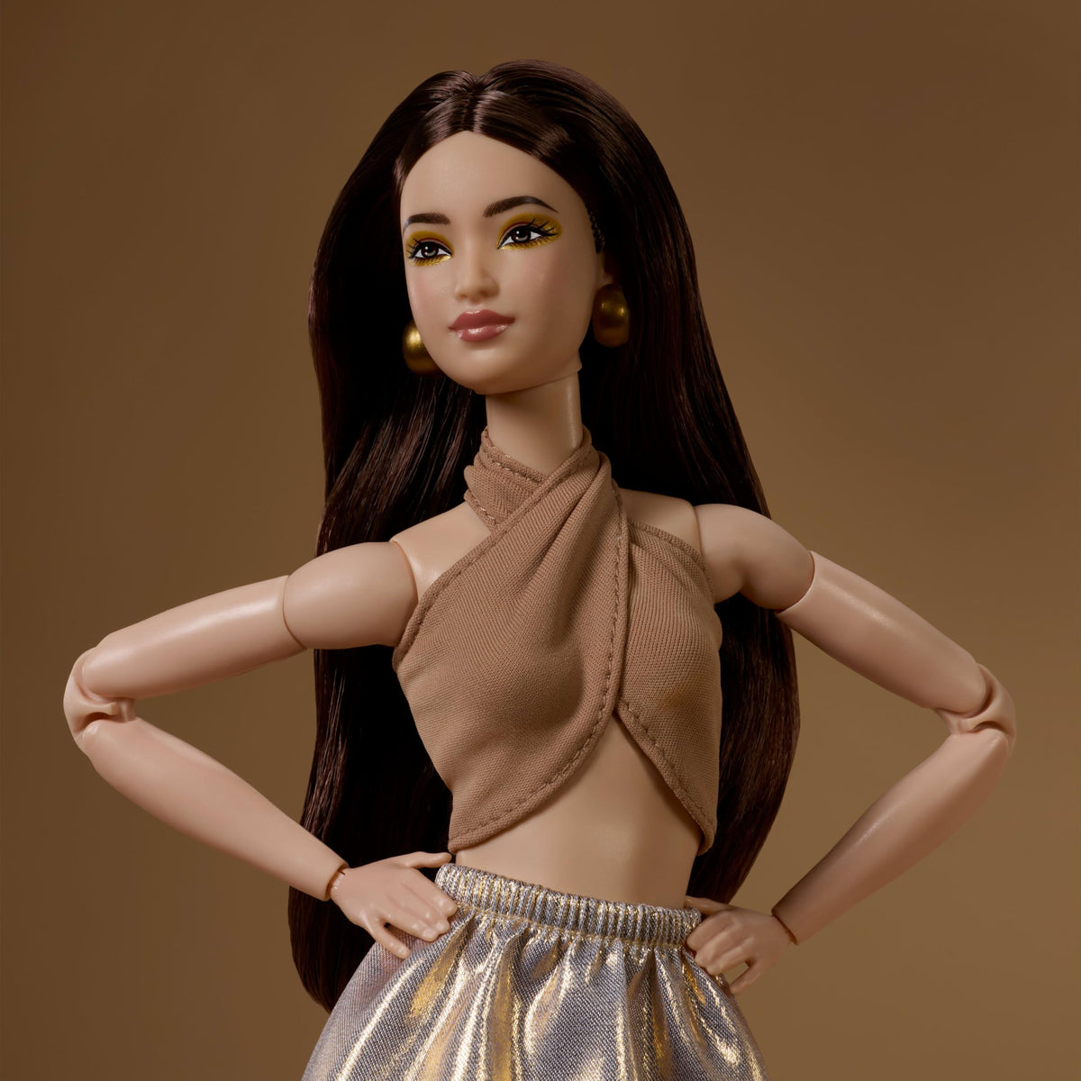 Barbie Basics Model 06 posable body enabling dynamic posing for photos.