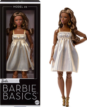 Barbie Basics Model 09 with brunette hair in a golden dress and strappy heels for display and photography
