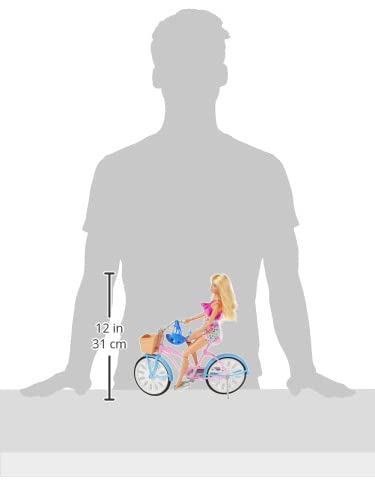 Barbie bike with pink and blue design and basket for small accessories.