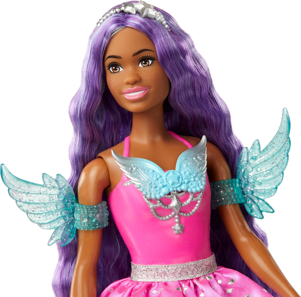 Barbie Brooklyn winged neckline with shimmering skirt enhances magical look.