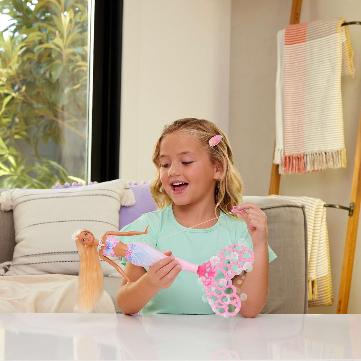 Barbie Bubble Sparkle Mermaid doll tail spin creates waves of bubbles for play