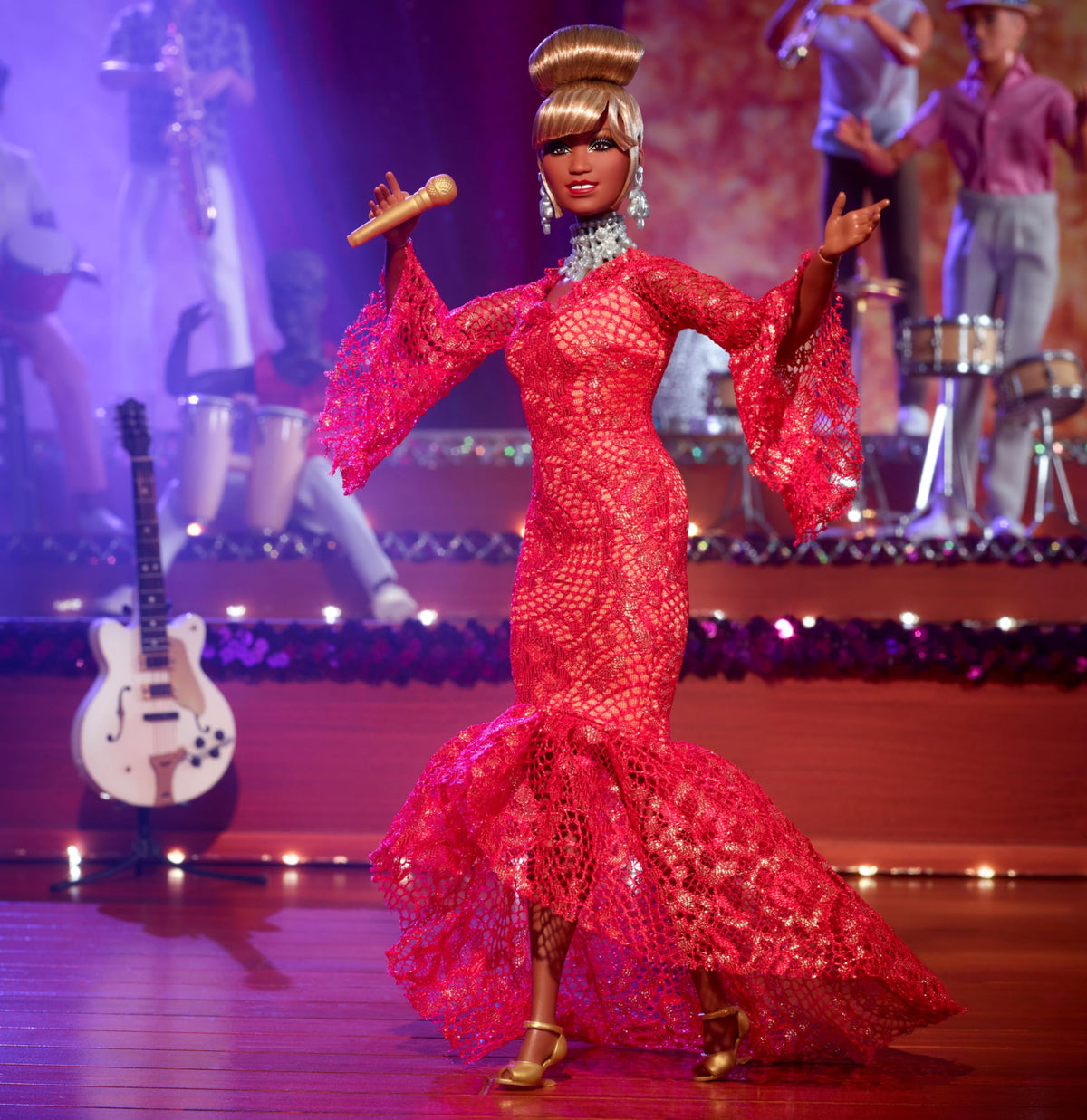 Barbie Celia Cruz with glamorous updo and makeup for stage-ready flair.