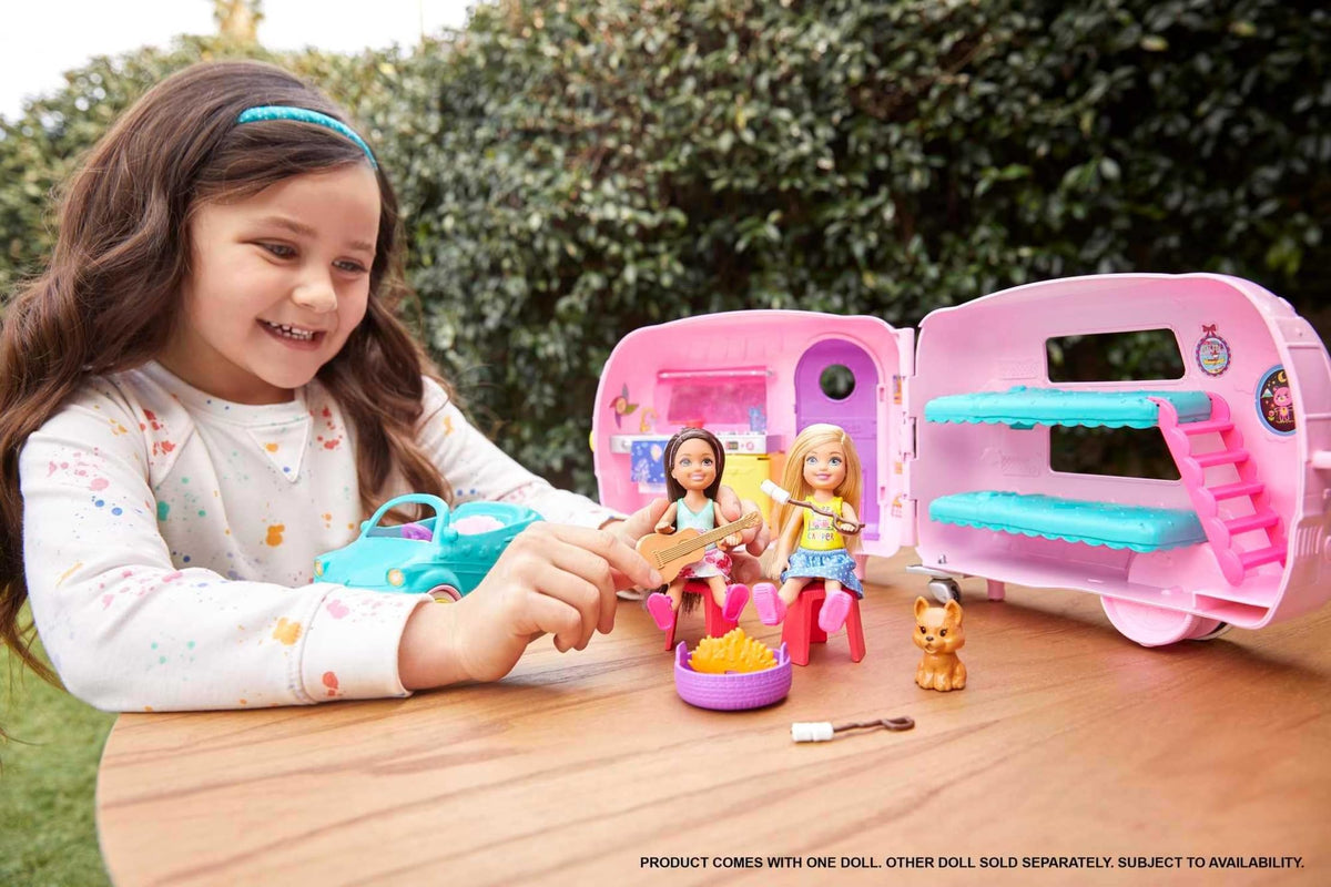 Barbie Chelsea doll in blue skirt ready for adventures in driver's seat