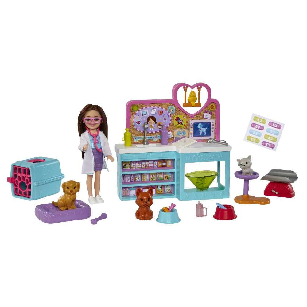 Barbie Chelsea doll in a white coat ready for pretend veterinary care