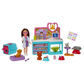 Barbie Chelsea doll in a white coat ready for pretend veterinary care