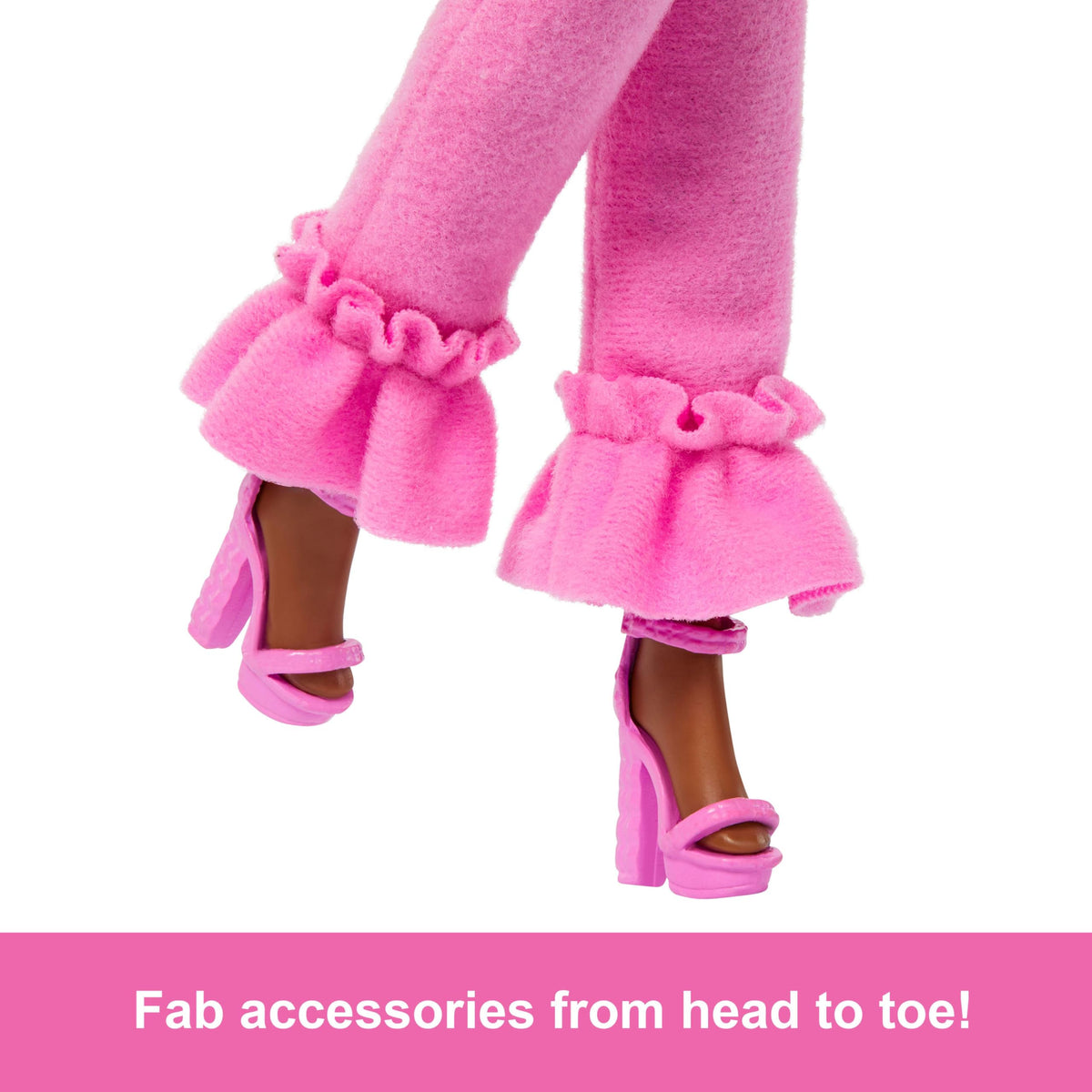 Barbie Deluxe Style Doll 4 features faux fur collar for elevated glam play.