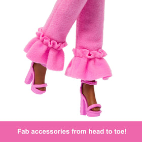 Barbie Deluxe Style Doll 4 features faux fur collar for elevated glam play.