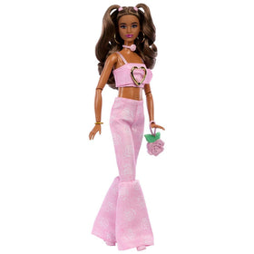 Barbie Deluxe Style doll bendable joints enable dynamic posing with handbag