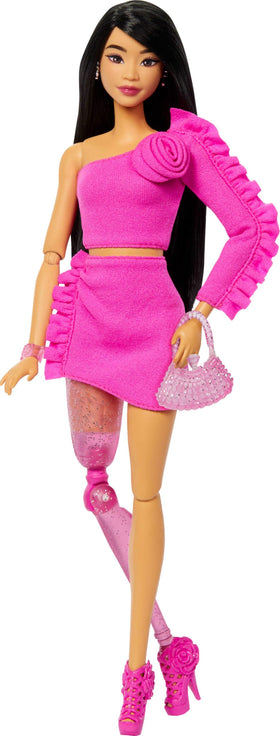 Barbie Deluxe Style doll with black hair and glitter prosthetic leg for bold fashion play