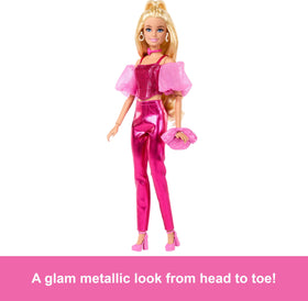 Barbie Deluxe Style Doll half-up hairstyle pairs with statement earrings.