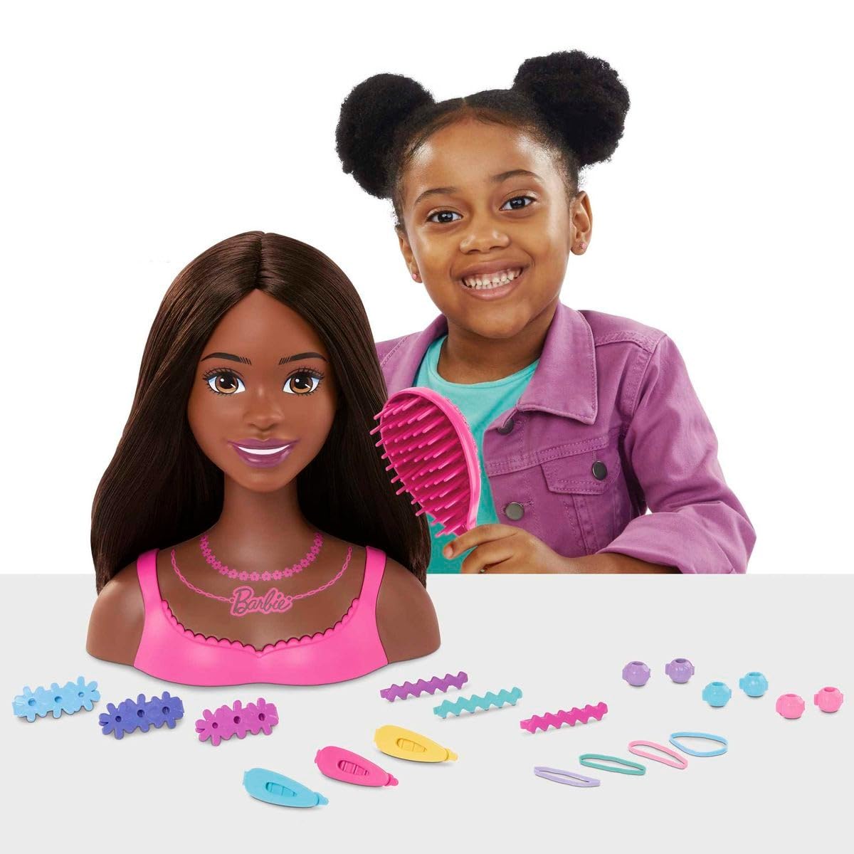 Barbie styling head close-up showing straight brown hair and styling brush.