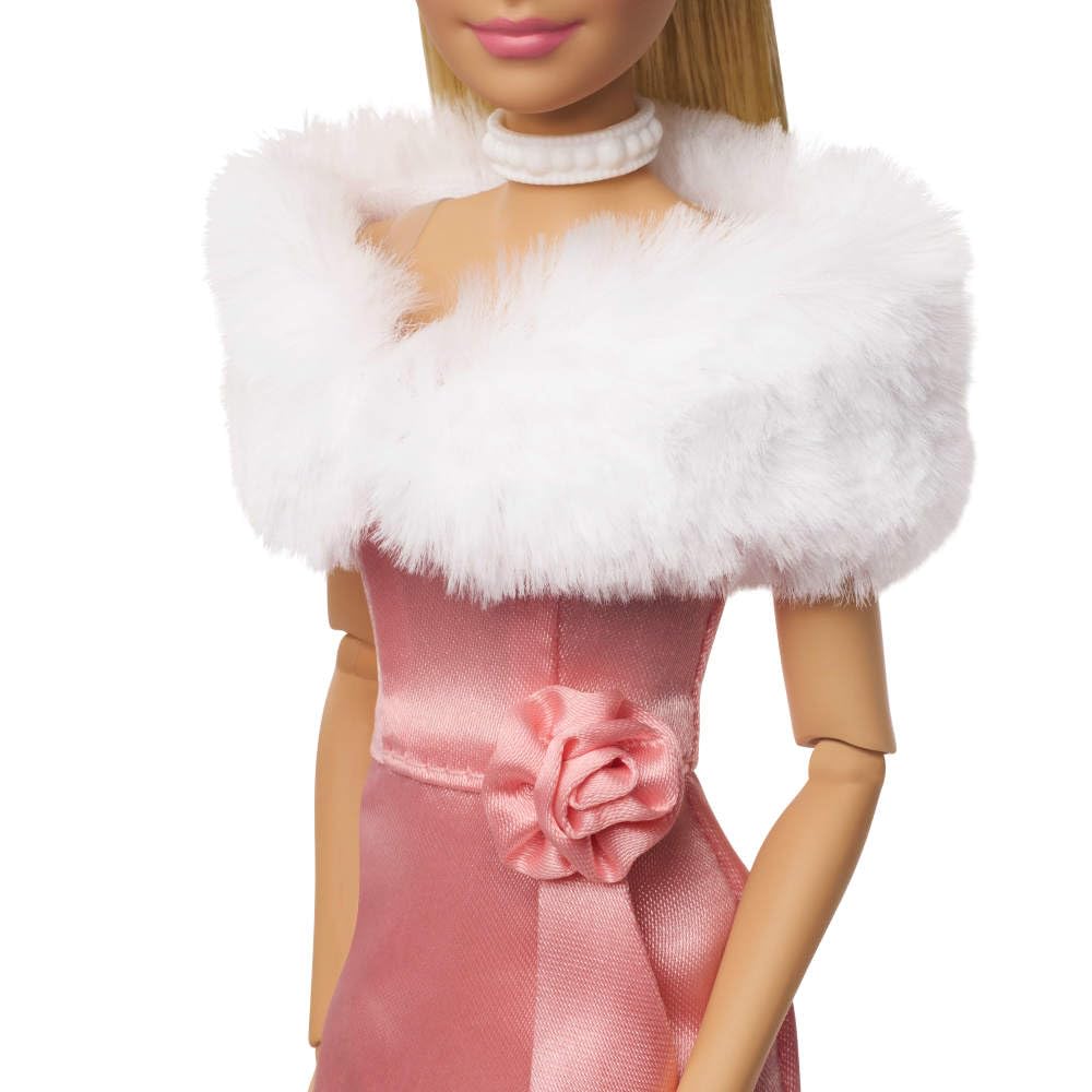 Barbie doll with updo, earrings, choker, handbag, and heels for stylish posing.