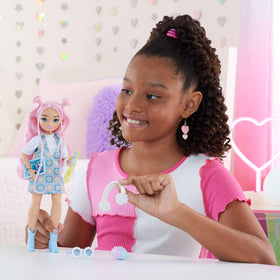 Daisy Jean wearing removable fashions with mix-and-match styling options.