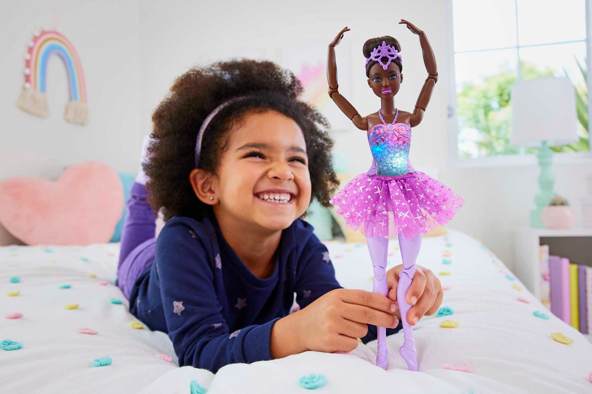 Barbie Dreamtopia brunette bun with tiara offers a stage-ready look