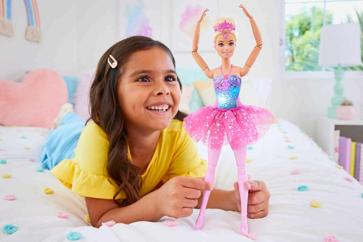 Barbie Dreamtopia light-up bodice illuminates colorful moments during play.