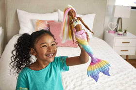 Barbie Dreamtopia Rainbow Magic Mermaid tail displays vibrant pastel colors after warm water