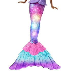 Barbie Dreamtopia Twinkle Lights mermaid doll has pink-streaked hair for imaginative looks.