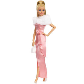 Barbie Enchanted Evening doll in pink dress with faux fur stole, ideal for imaginative play and display.