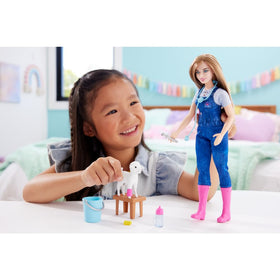 Barbie farm vet doll in overalls and pink boots for storytelling