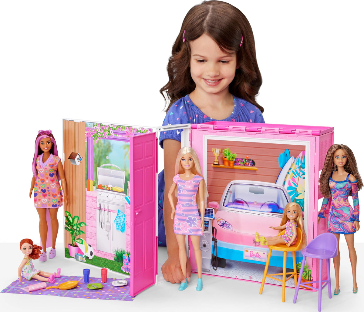 Barbie Getaway House with four play areas invites imaginative stories and role play.