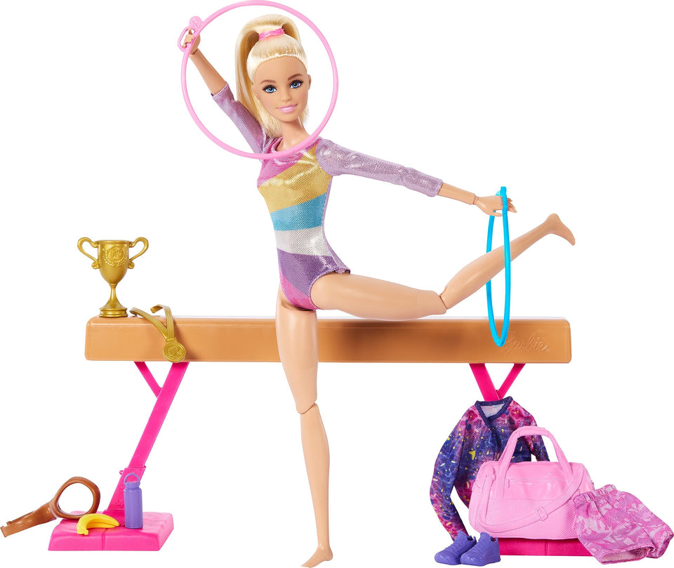 Barbie gymnastics doll on balance beam for imaginative, coordinated routines.