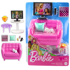 Barbie indoor living room setup with kitten for imaginative play during movie night