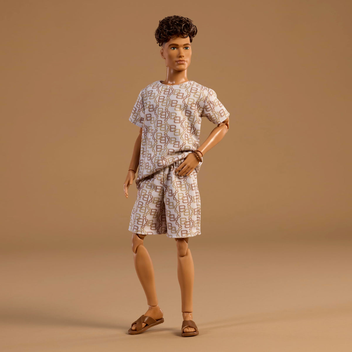 Barbie Ken Basics Model 10 wearing a shirt and shorts with a matching print.