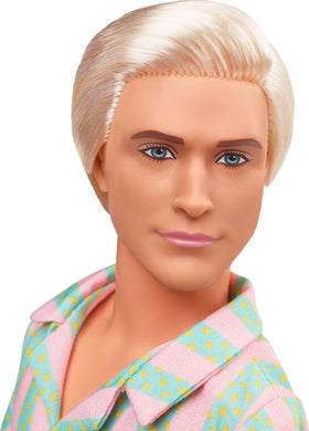 Ken doll with striped shorts and pockets for storytelling and outfits.