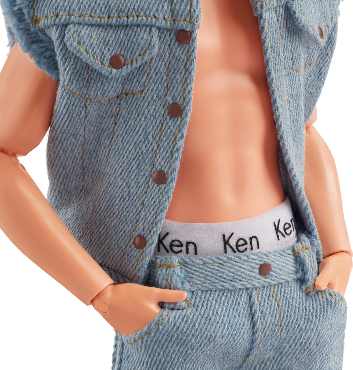 Ken doll peeks at signature underwear, adding collectible charm