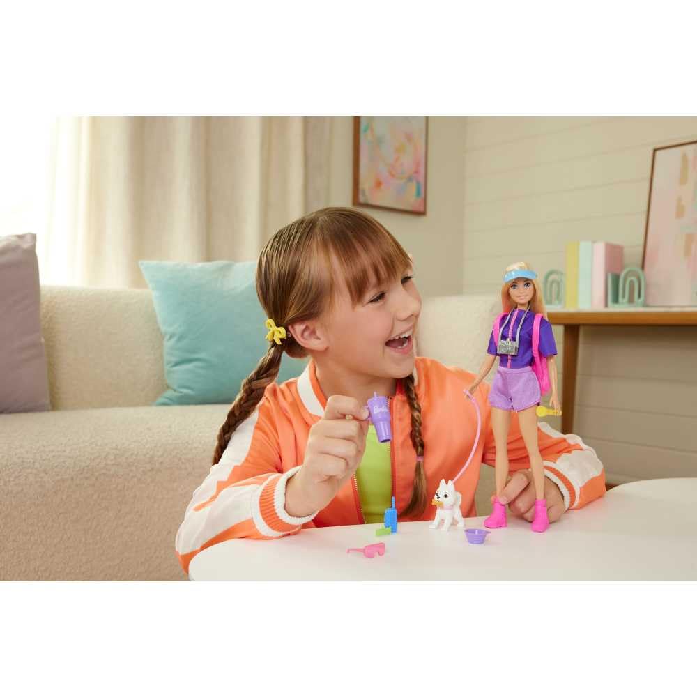 Barbie Malibu doll in purple shirt and shorts ready for adventures