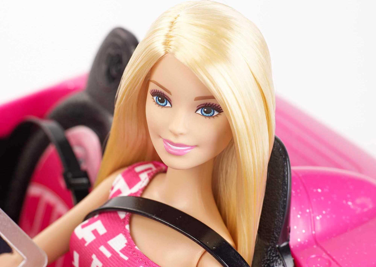Barbie open-roof design enables sunny day adventures during pretend road trips.