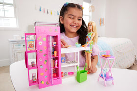 Barbie pantry sliding shelves reveal organized storage during pretend cooking sessions.