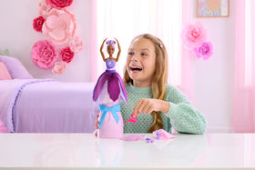 Barbie Petal Pop watering can reveals bloom during unboxing.