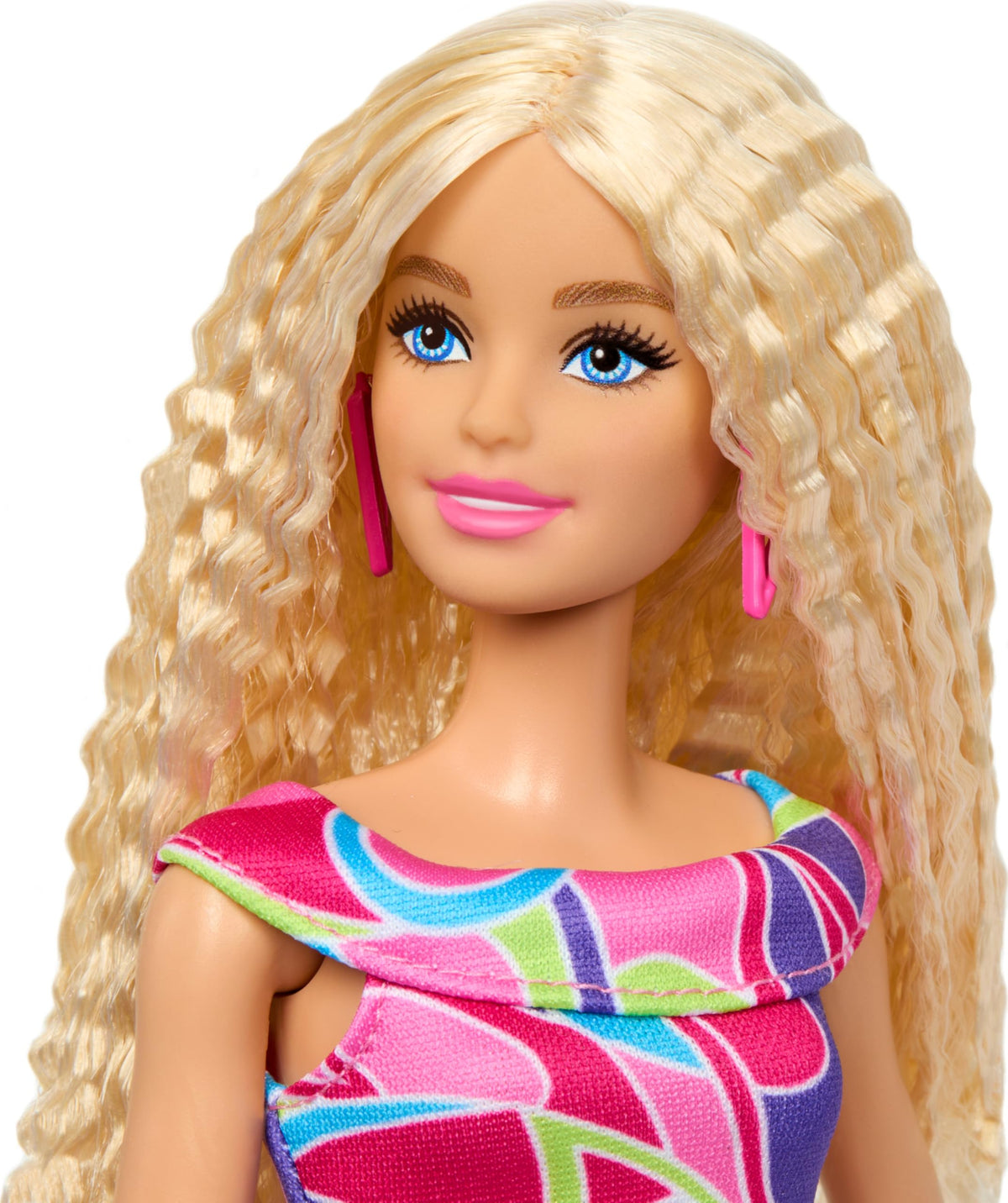 Barbie pink heels and bright pink earrings add bold fashion flair.