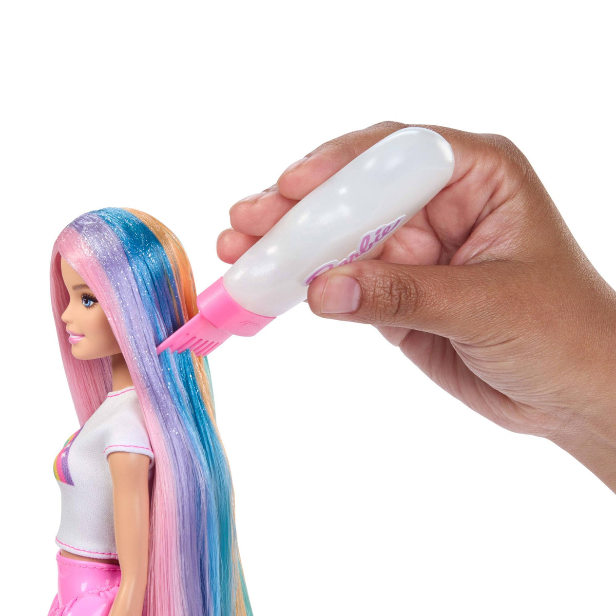 Barbie Rainbow Sparkle Hair Doll styling tools enable pretend salon sessions.