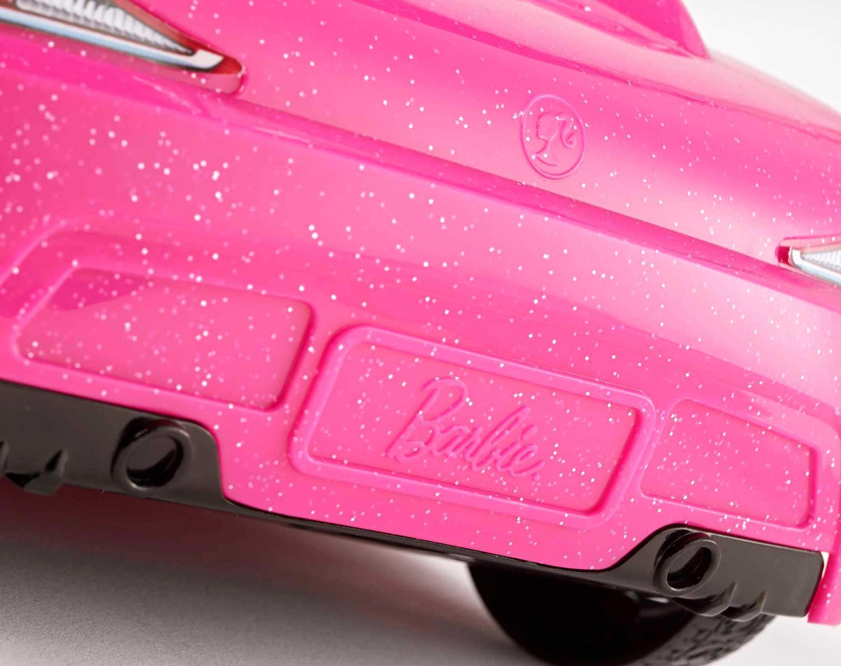 Barbie car tires look realistic for dynamic, imaginative road adventures.
