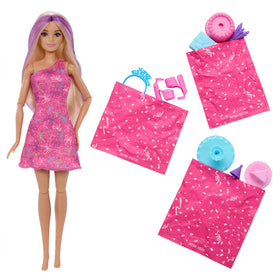 Barbie Rise & Surprise puppy rides along the party scene for imaginative play.