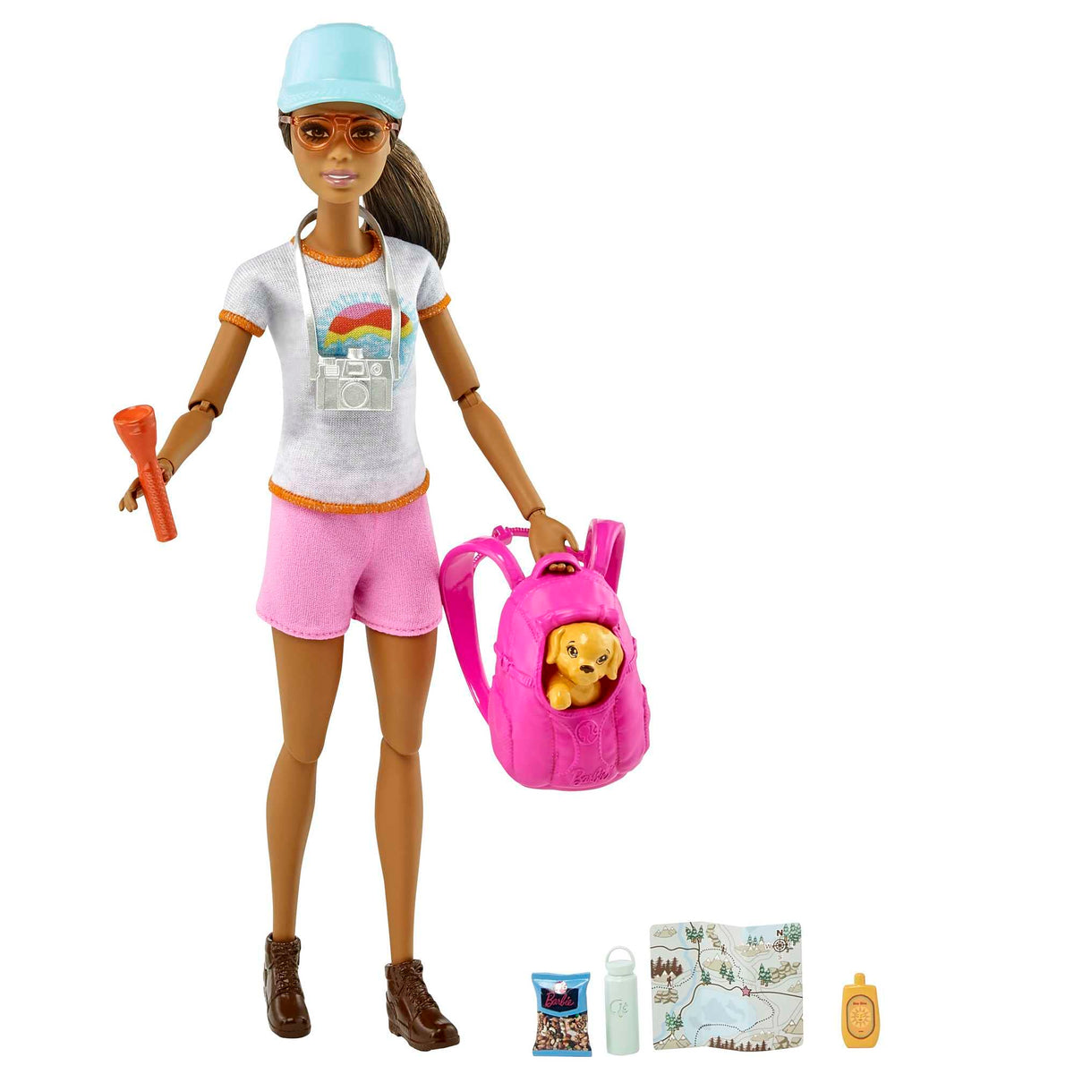 Barbie Self-Care doll hiking with puppy and backpack for imaginative outdoor play.
