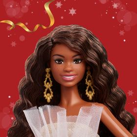 Barbie Signature 2025 Holiday doll in display packaging, ready for gifting or shelf highlight.