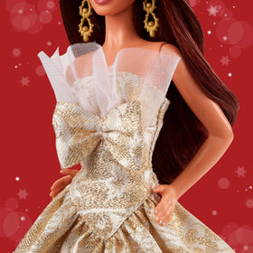 Barbie Signature earrings and gold heels complete the luxe holiday look.