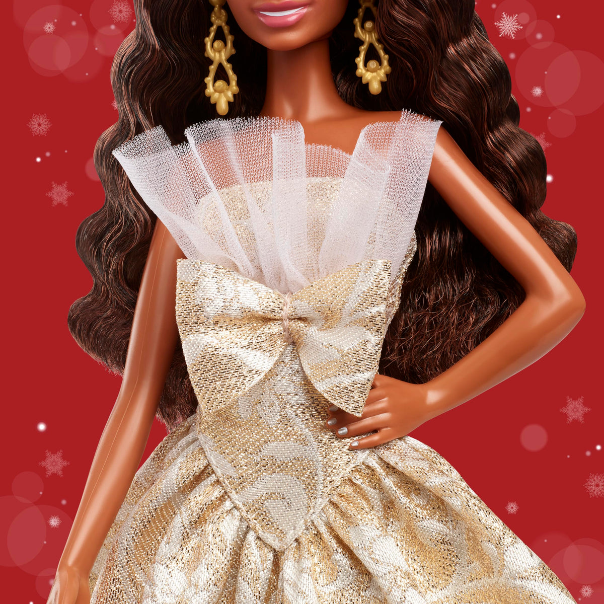 Barbie Signature 2025 Holiday doll with gold drop earrings and jeweled heels, festive elegance.
