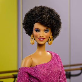 Barbie Debbie Allen tribute doll wearing a gold belt for a classy collectible look