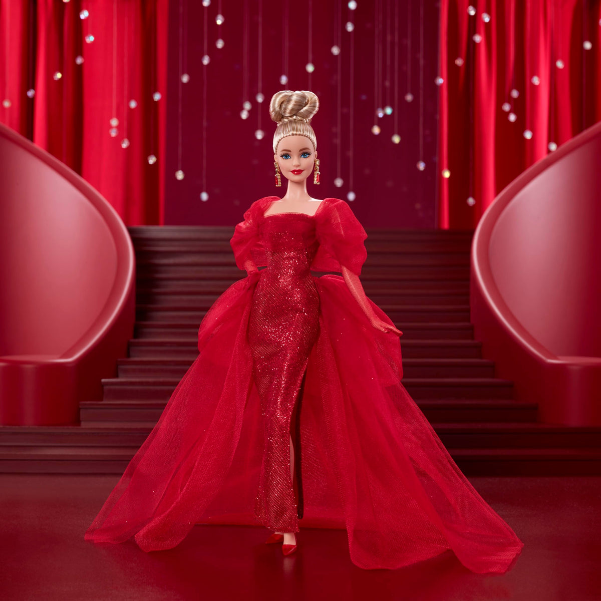 Barbie Signature Doll with drop earrings featuring golden M logo