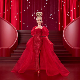 Barbie Signature Doll with drop earrings featuring golden M logo