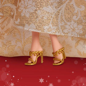 Barbie Signature embellished mules complete the festive doll look.