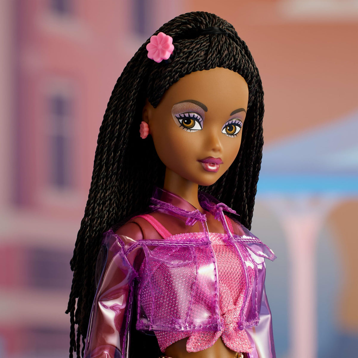 Barbie Signature Jai with tinted sunnies and gold belly chain for bold accessorizing.