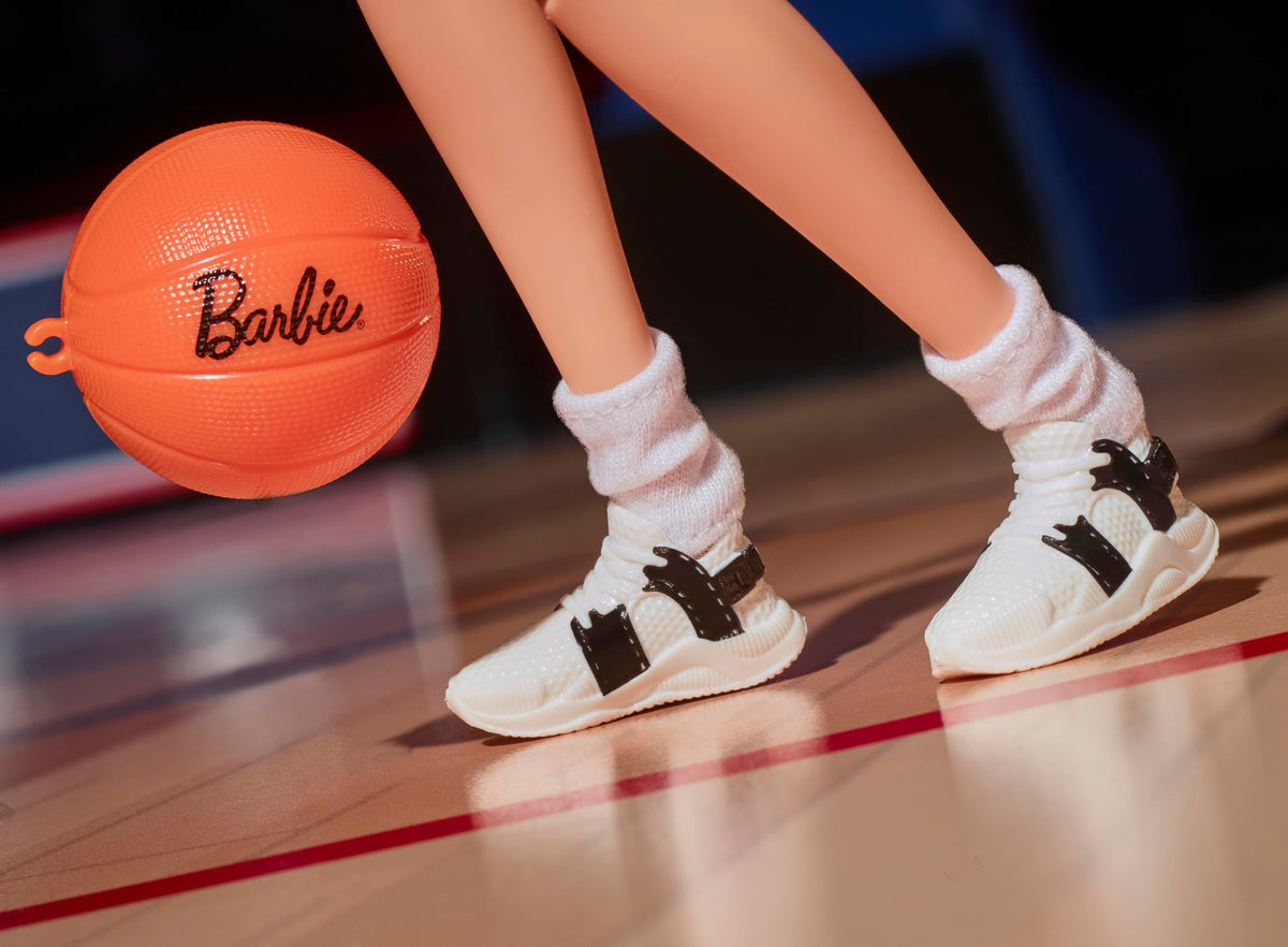 Barbie Sue Bird doll with sleek ponytail and game-ready detail.