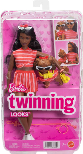 Barbie Twinning Looks bendable joints help pose lifelike scenes.